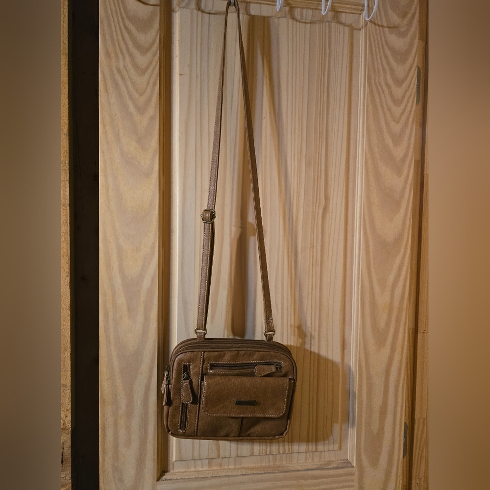Small darker tan crossbody purse